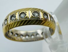 An 18ct gold eternity ring, approximate weight 4g and size L 1/2