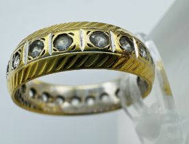 An 18ct gold eternity ring, approximate weight 4g and size L 1/2