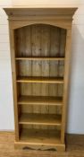 A pine bookcase with five shelves (H198cm W84cm D36cm)