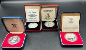 A selection of four silver proof crown coins, two Silver Jubilee, 40th anniversary of the Coronation