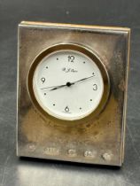 A Carrs silver clock, hallmarked to front.