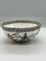 A Chinese decorated porcelain bowl with scalloped edge