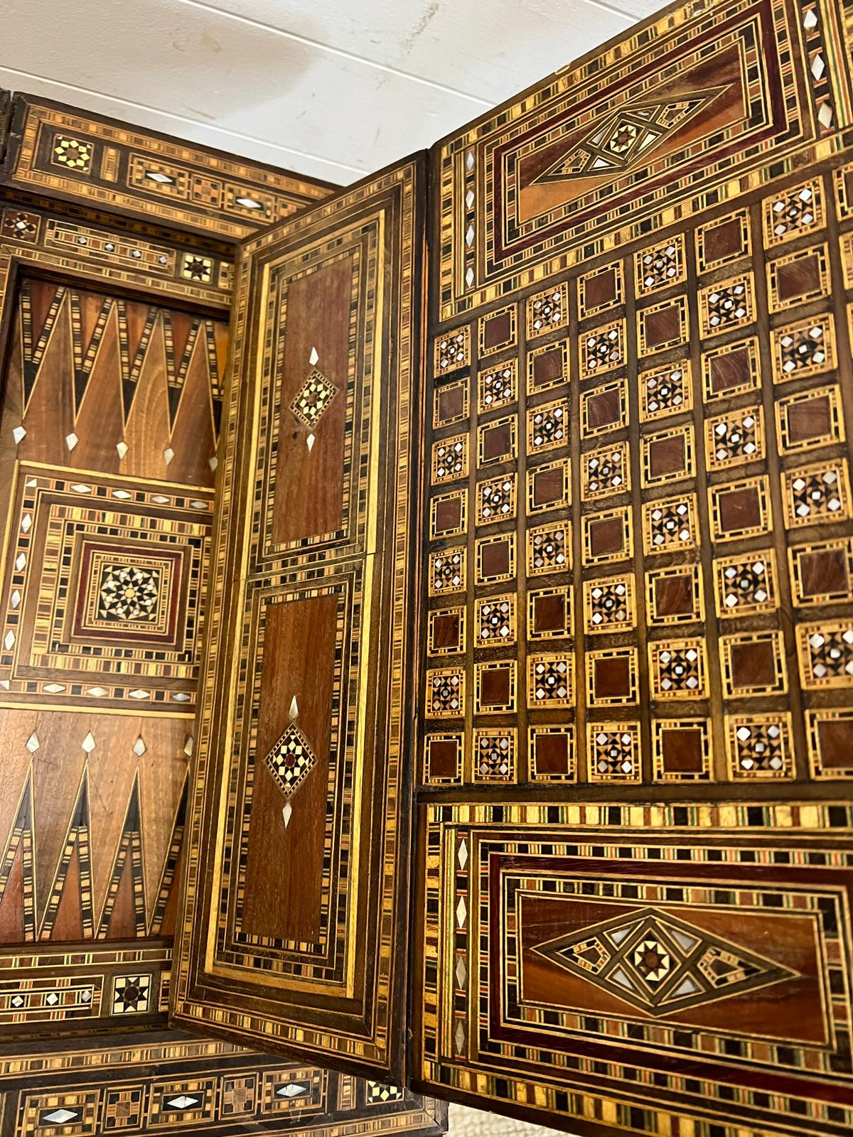 A marquetry inlaid games table with playing surface, back gammon, chess board etc , Damasais or - Image 6 of 9