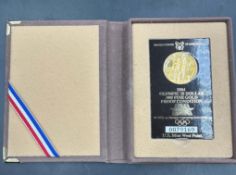 A 1984 United States Olympic 10 Dollar 900 Fine Gold Proof Coin, in case with certificate 0079169