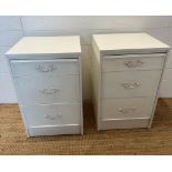 A pair of white bedside tables with Louis style handles (H69cm W44cm D42cm)