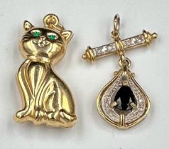 A 9ct gold cat pendant (approximate weight 2g) and a 9ct gold pendant with central sapphire stone (