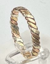 A three coloured 9ct gold ring, approximate weight 3.3g