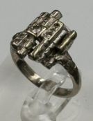 An 18ct white gold bark effect with inset diamonds ring, approximate weight 6.8g