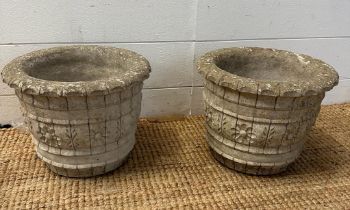 Two concrete garden planters with floral banded motif (H22cm Dia28cm)