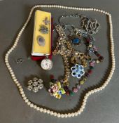 A selection of costume jewellery including some silver, various styles and finishes.