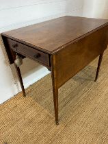 A drop sided Pembroke table on tapering legs and drawers (H72cm W106cm D81cm