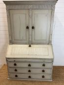 A painted French style bureau bookcase the fall front opening to reveal waterfall drawers and four