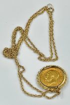 A 1912 Half Sovereign, in a 9ct gold mount on a 9ct fine necklace (Approximate Total Weight 8.9g)