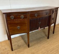 A Georgian mahogany sideboard with string inlay and roll shutter cupboards (H100cm W168cm D71cm)