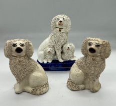 Three Staffordshire poodles figurines (Tallest H14cm)