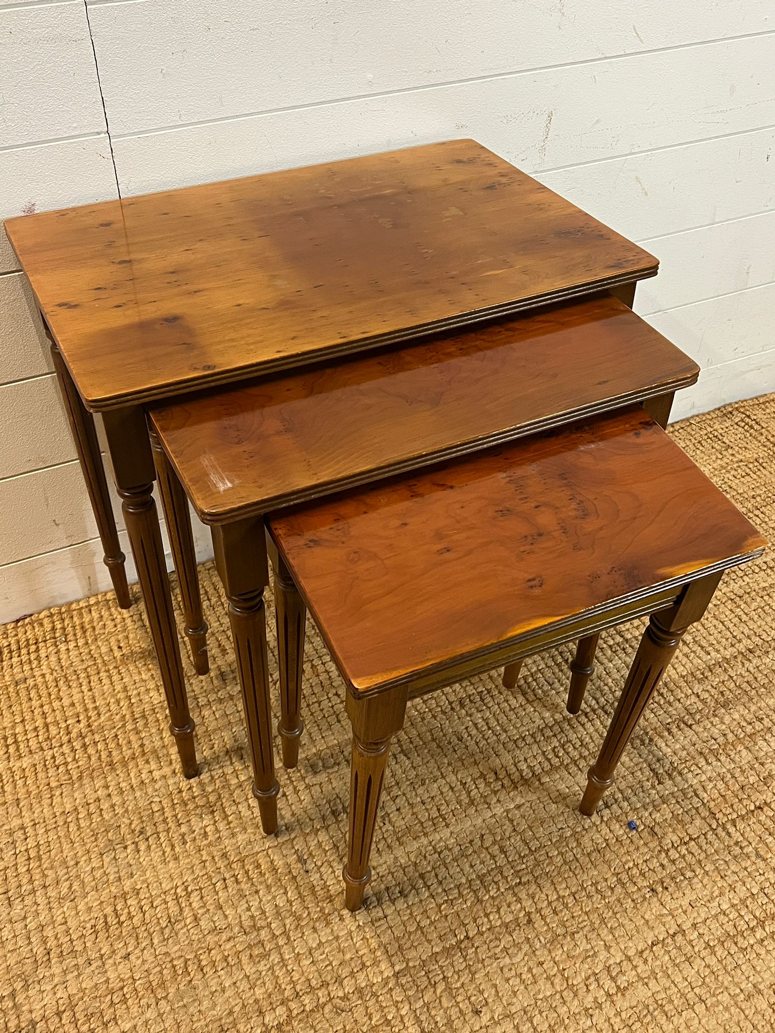 A nest of three table on fluted legs (H54cm W56cm D38cm) - Image 2 of 4