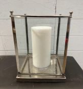 A square chrome glass panelled table lantern