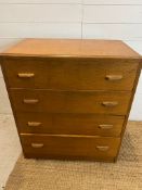 A 1940's untility furniture chest of drawers by Gomme (H87cm W76cm D46cm)