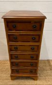 A Yew six drawer tall boy (H89cm W38cm D37cm)