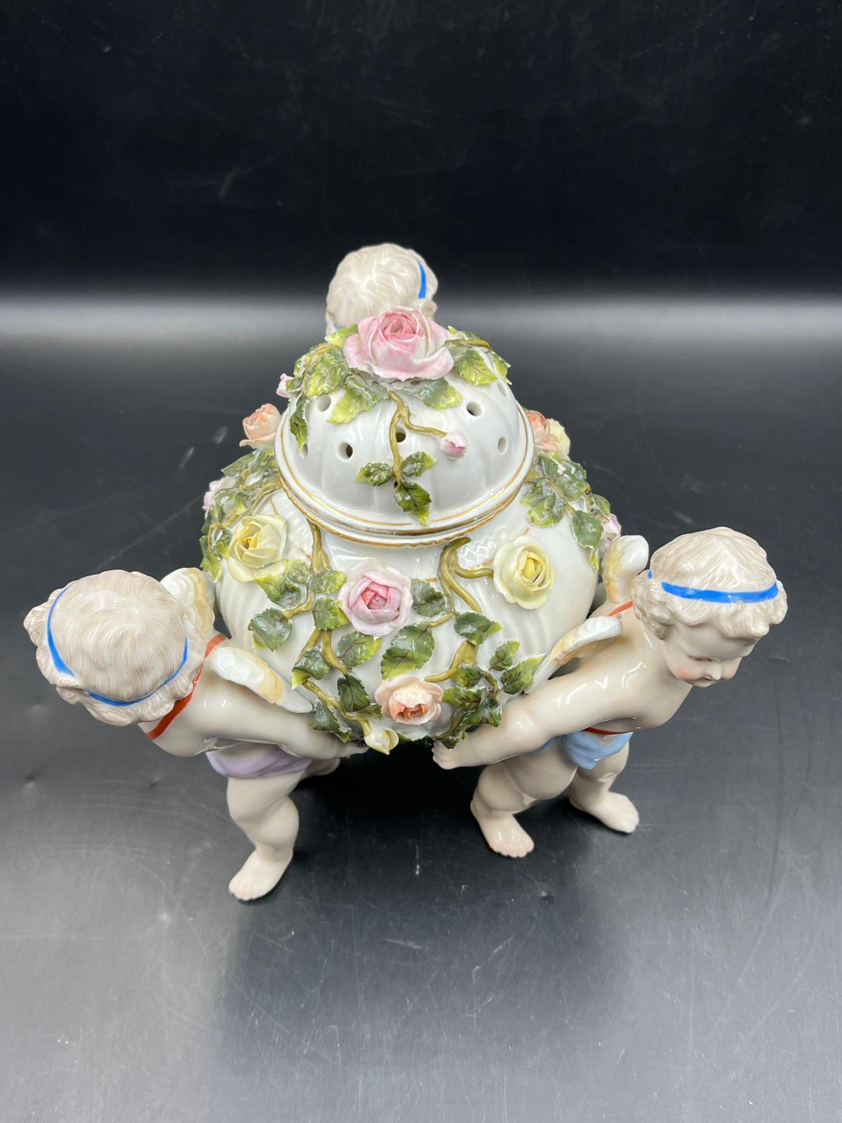 A Sitzendorf porcelain center piece with three cherubs supporting a lidded bowl decorated with - Image 3 of 5