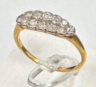 An 18ct gold diamond cluster ring, size P1/2 and approximate weigh 2.4g