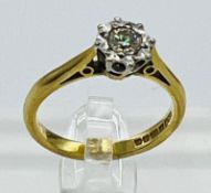 An 18ct gold diamond ring, approximate size K1/2, makers mark MLP.
