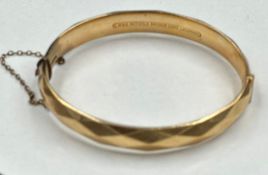An LW & G 9ct gold bracelet with bronze core