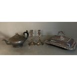 A selection of mixed metal items, a serving dish, two candlesticks and a pewter tea pot