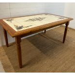 A pine tiled top kitchen table (H76cm W106cm D98cm)