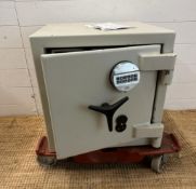 An M Locks digital safe. 49x49x49