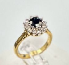 A sapphire and diamond cluster ring, approximate size J 1/2 on 18ct gold
