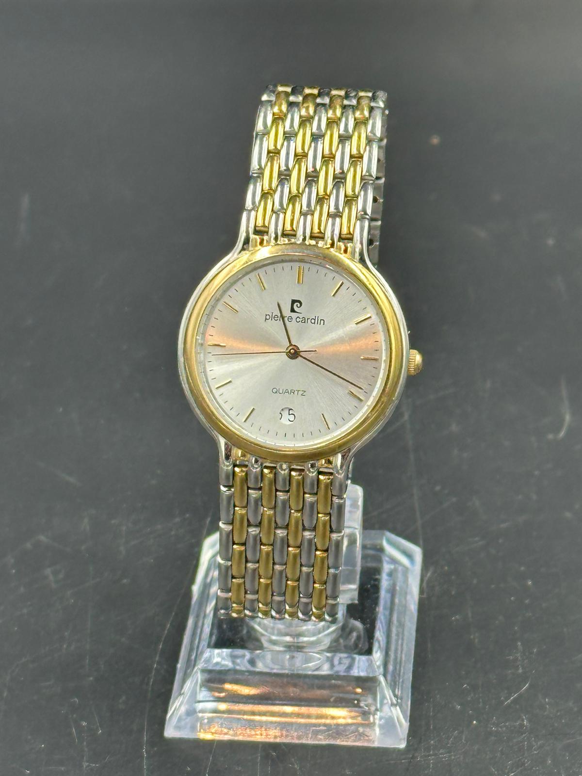 A Pierre Cardin Quartz wristwatch, engraved to back