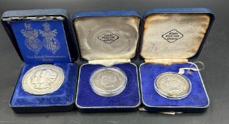 Three Commemorative medals: The Royal Anniversary Medal by John Pinches and two Duke of Windsor