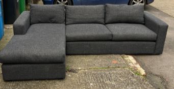 A corner sofa upholstered in a grey highland tweed by sofa.com