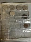 An album of collectable Great British coins to include: Half Pennies, pennies, ten pence etc.