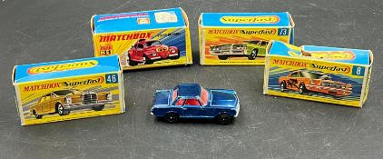 Four Matchbox Diecast vehicles and one Corgi unboxed