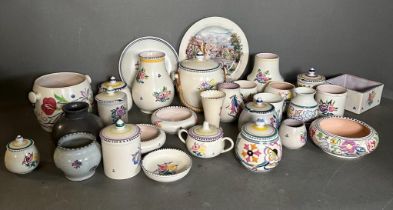 A selection of Poole pottery to include pots, dishes and biscuit barrels