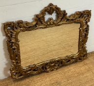 A wooden gold painted mirror in the Rococo style 80cm x 70cm
