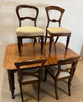 A Regency style mahogany extendable table with six chairs of two different styles (H73cm W144cm