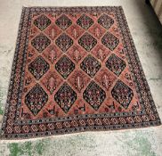 A Persian style rug with geometric pattern 170cm x 142cm