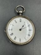 A silver pocket watch, hallmarked for Birmingham 1886