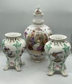 A lidded figural urn by Von Schierholtz and a pair of Meissen Baluster vases (H21cm)