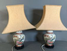 A pair of Chinese style table lamps with peacock design