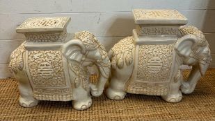 Two white ceramic elephant themed plant stands (H37cm and H39cm)