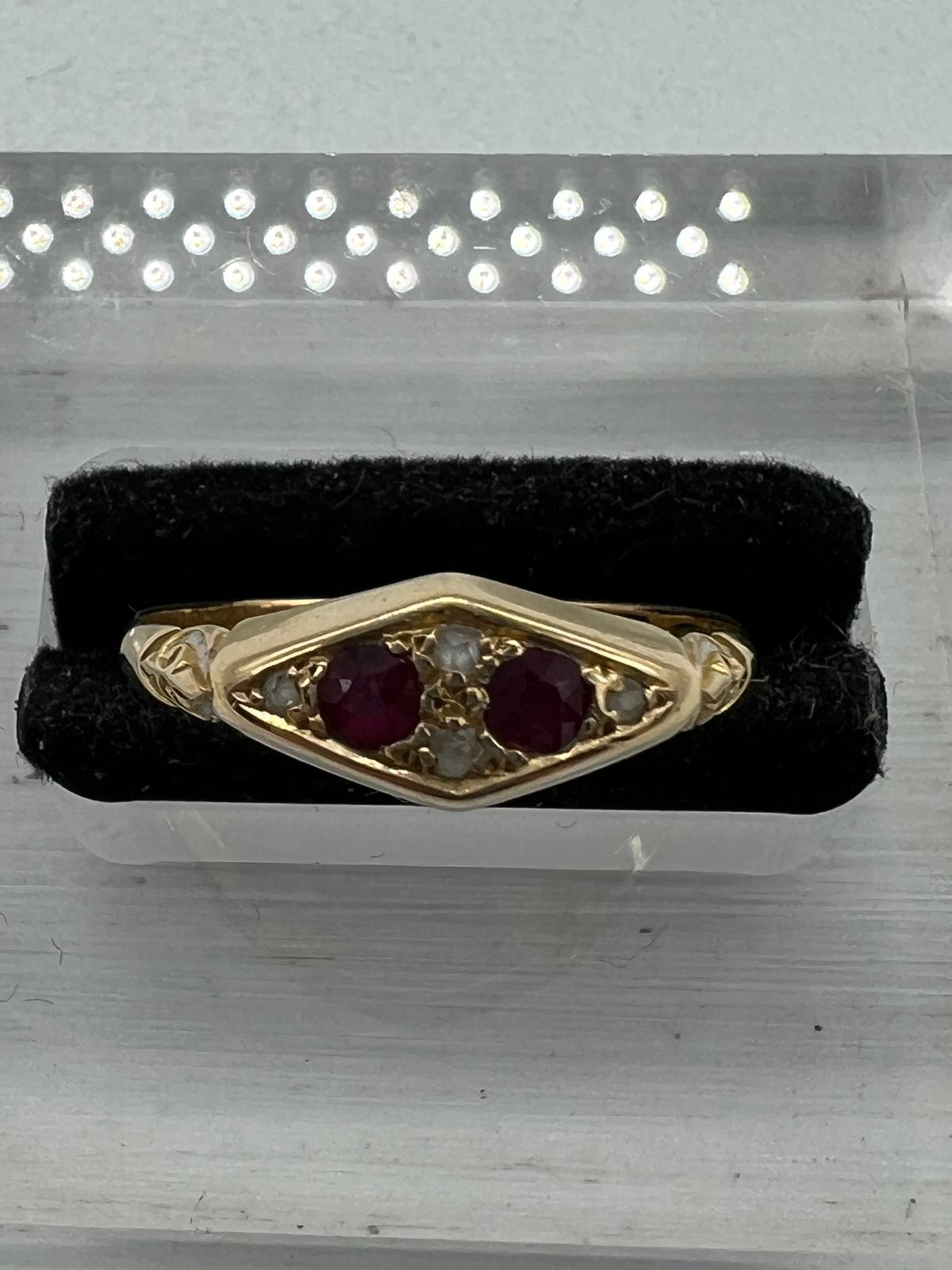 An 18ct gold antique ring with inset rubies and ornate design, approximate total weight 2.1g and - Image 3 of 7