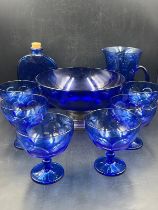 A selection of cobalt blue glassware to include bowls, glasses etc.