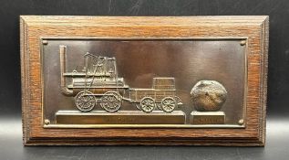 A commemorative plaque depicting No 1 Engine of George Stephenson and Bulmerstone