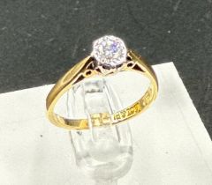 An 18ct yellow gold and platinum set diamond ring, approximate size J1/2