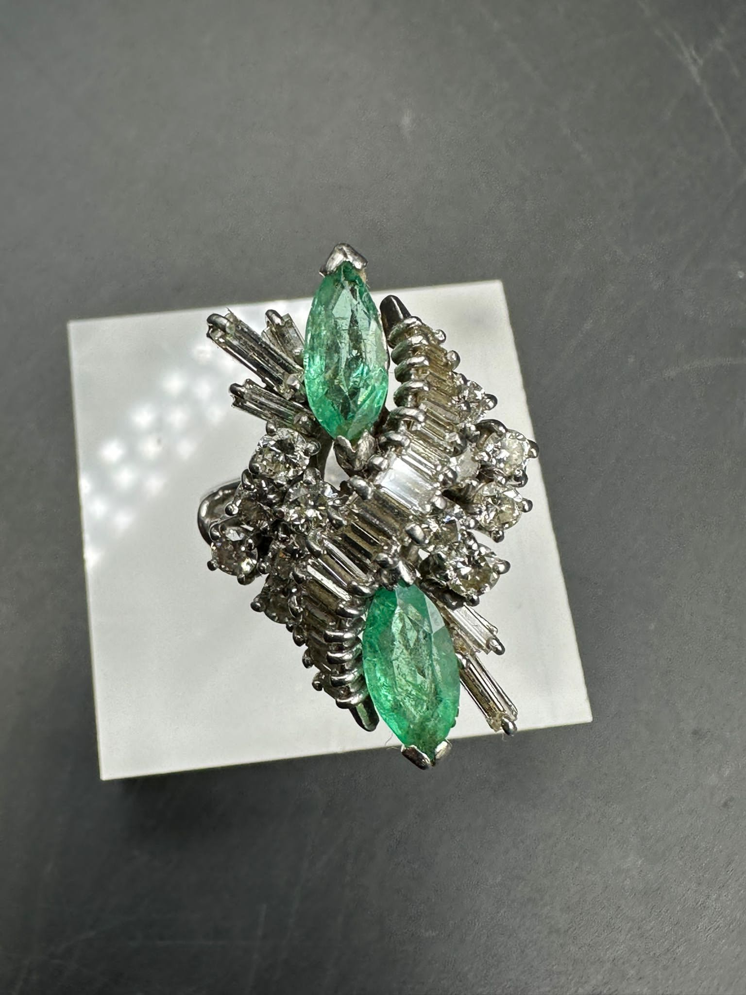 An emerald and diamond ring, designed a s a vertically set elongated cluster with two marquise cut - Image 5 of 11