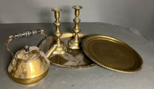 A selection of brass items to include candlesticks, trays and a kettle